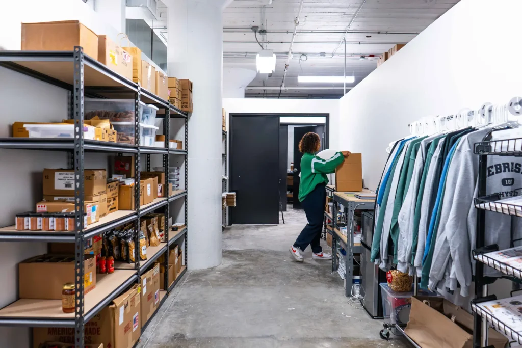 A well-organized warehouse with shelves full of neatly stored products, showcasing efficient storage solutions.