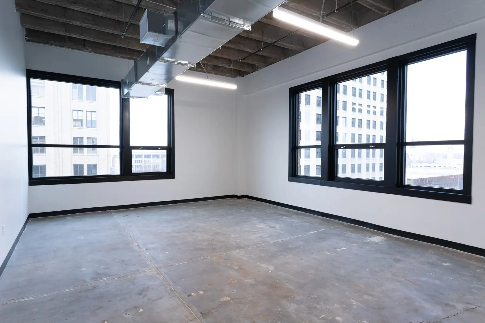 Private office with two walls of windows at Elevator Lincoln