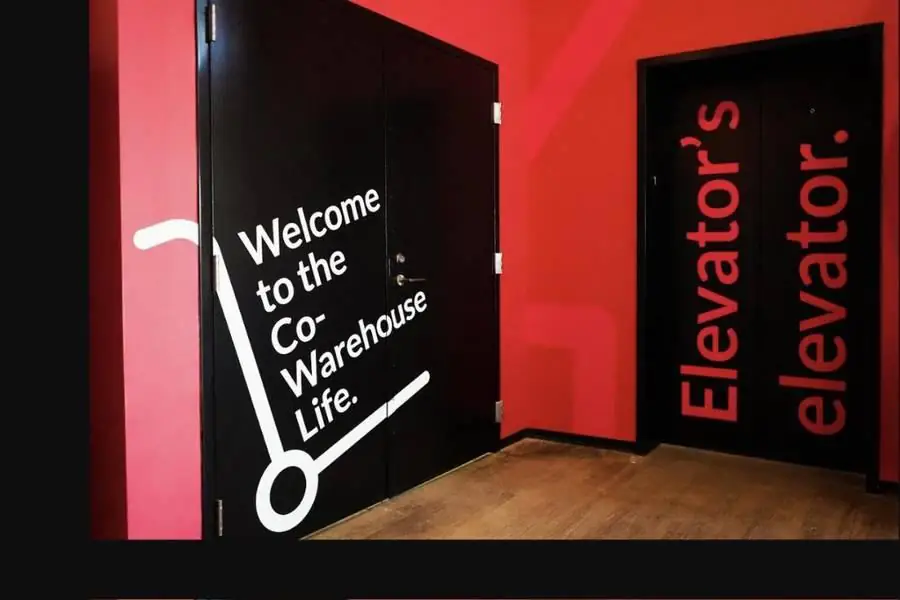 Welcome to the co-warehouse life, branded entry at Elevator Omaha