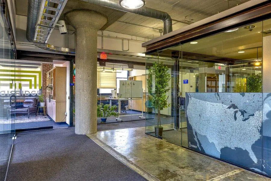 Glass-walled offices and reception