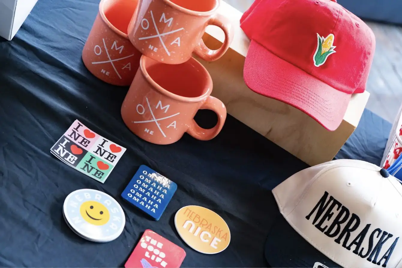 Member-made products, Omaha mugs, hats and stickers by Made In Omaha