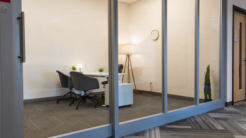 Glass-fronted private offices at Elevator St. Louis