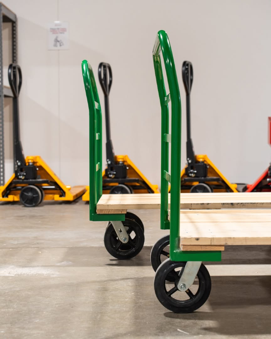 Warehouse carts and pallet jacks at a co-warehousing facility in Lincoln, Nebraska