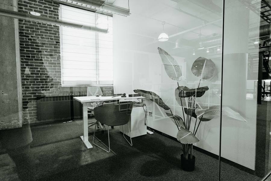 A private office seen through glass at Elevator Omaha