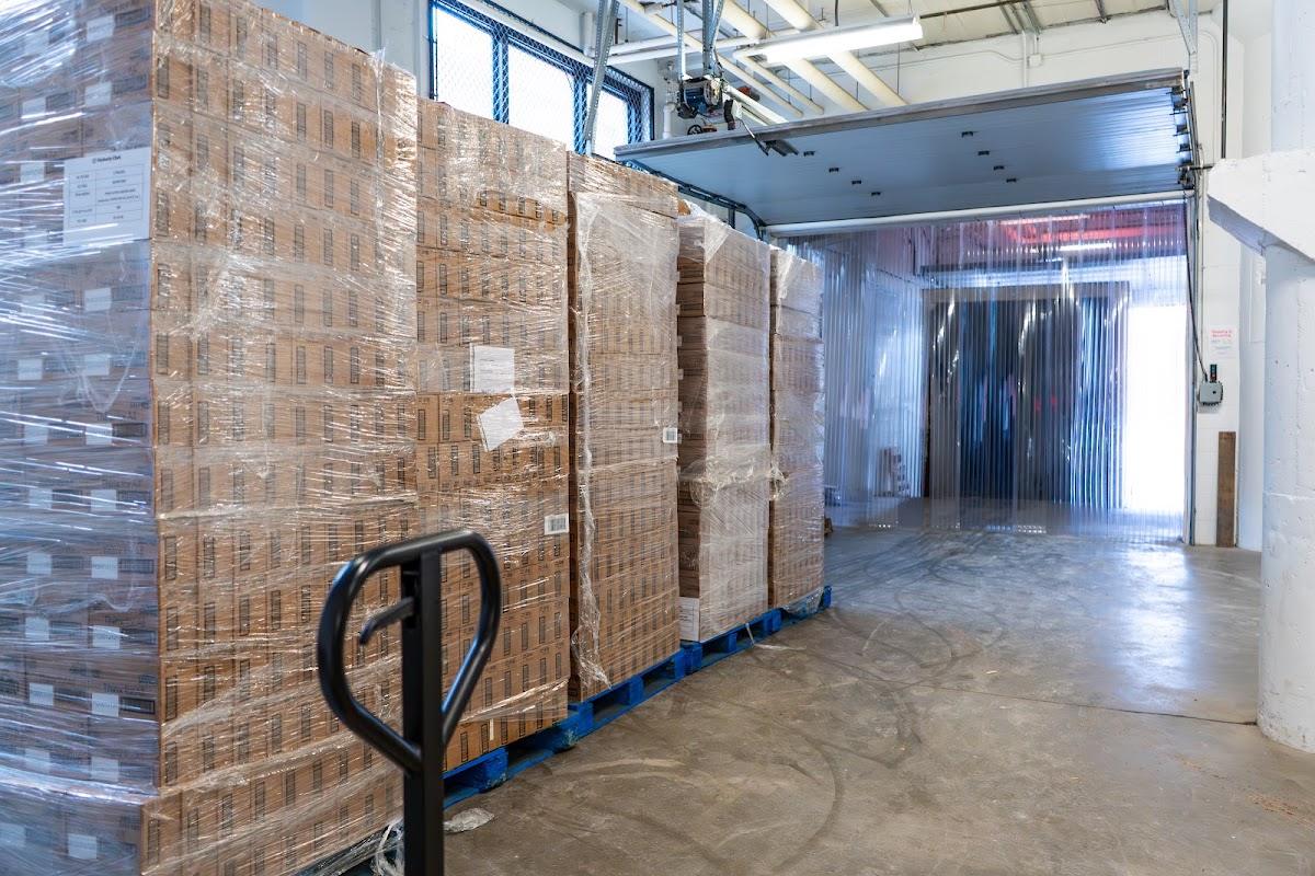 Freight in, pallet jack on hand